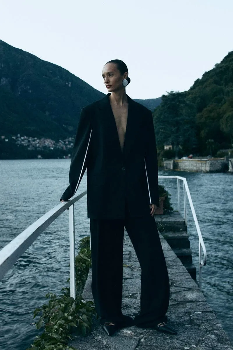 BLACK JACKET WITH WHITE DETAIL